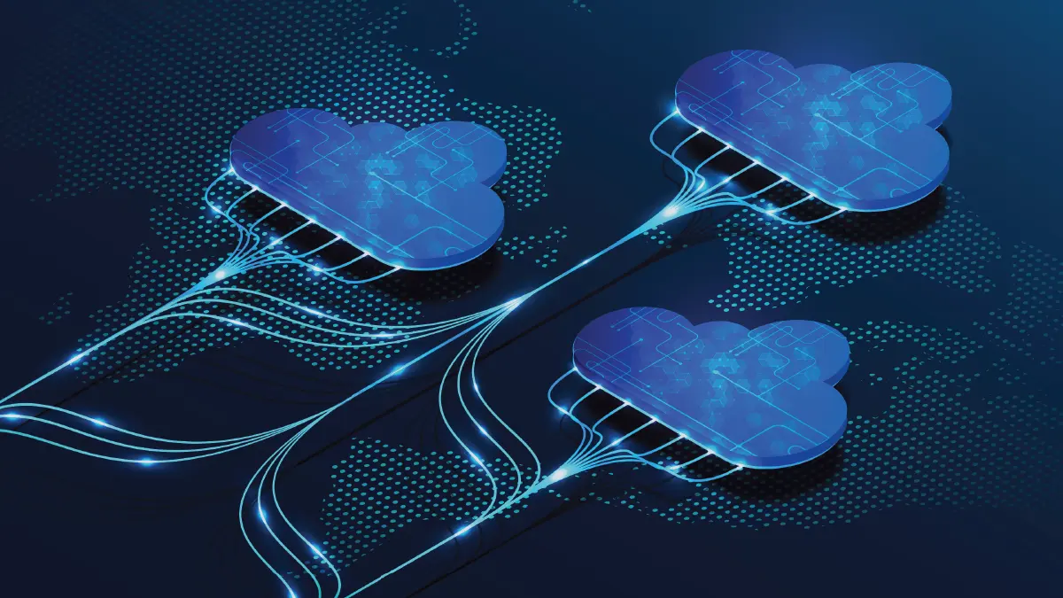 An image, where in the foreground, there are two stylized cloud graphics interconnected by a flowing, white line, symbolizing connectivity or data transfer between hybrid cloud and multi-cloud environments. The clouds are adorned with digital circuit patterns, suggesting advanced technology and networking. This image visually represents the concept of using multiple cloud computing services to prevent dependence on a single provider, known as vendor lock-in. The design elements suggest flexibility and interconnectedness, key benefits of hybrid and multi-cloud strategies.