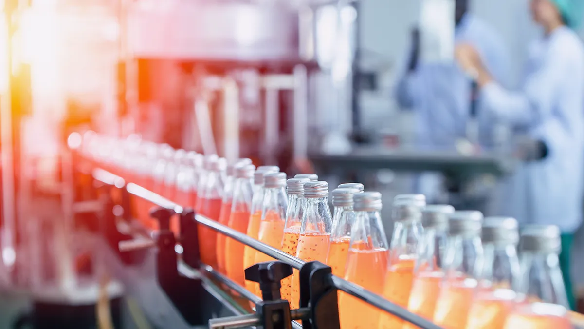 Lesson Learned Explained: Improving KPIs in the FMCG Industry through automation and data analysis on semi-automated production lines