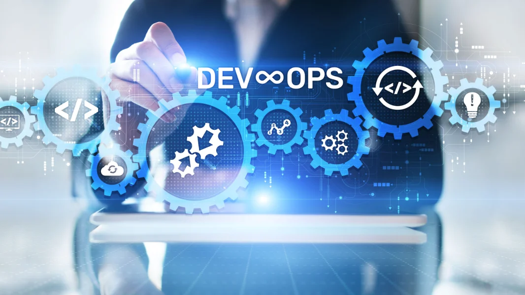 A factory worker looks at machine data focusing on monitoring OEE production efficiency