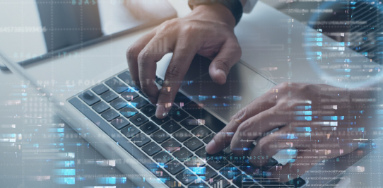 Hands typing on a laptop keyboard overlaid with icons representing IT service management processes (ITSM)
